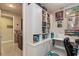 Office featuring floor to ceiling white shelving and cabinets at 2157 Bay Line Rd, Oakland, FL 34787