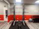 Community gym featuring squat rack, bench and free weights at 3028 Parkway Blvd # 305, Kissimmee, FL 34747