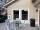 Relax on the patio with a table and chairs, perfect for enjoying the outdoors at 3028 Parkway Blvd # 305, Kissimmee, FL 34747