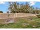 View of a large stone backyard fence separating the yard from neighboring homes at 3086 Fieldwood Cir, St Cloud, FL 34772