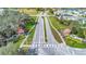 View of the community entrance with manicured landscaping and signage at 3086 Fieldwood Cir, St Cloud, FL 34772