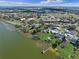 Aerial view highlighting waterfront homes with private docks and beautiful lake scenery in residential neighborhood at 331 Bay St, Auburndale, FL 33823