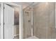 The bathroom showcases a modern glass-enclosed shower with stylish tile and fixtures at 3348 Vine Leaf St, Apopka, FL 32712