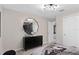 The bedroom features modern decor and a mirror at 3348 Vine Leaf St, Apopka, FL 32712