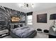 Star Wars themed bedroom features a gray bed with matching decor and modern light fixture at 3372 Vine Leaf St, Apopka, FL 32712