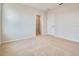 A bright bedroom features neutral carpet, a walk-in closet and white walls at 3431 Islewood Ct, Ocoee, FL 34761