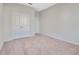 Bright bedroom featuring carpet floors and a double door closet at 3431 Islewood Ct, Ocoee, FL 34761