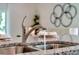 Close-up shot of a modern kitchen faucet and granite countertop, highlighting sleek design and quality finishes at 3476 Sandalwood Isle Way, Ocoee, FL 34761