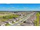 Expansive aerial view of a residential community, showcasing the neighborhood layout and home density at 362 Sofia Ln, Lake Alfred, FL 33850