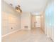 Bright dining room featuring tile floors, modern light fixture, and a 