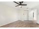 Bedroom with laminate flooring and a ceiling fan at 4087 Clock Tower Dr, Port Orange, FL 32129