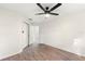 Bedroom with wood-look flooring and a ceiling fan at 4087 Clock Tower Dr, Port Orange, FL 32129