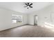 Bedroom featuring a large window and wood floors at 4087 Clock Tower Dr, Port Orange, FL 32129