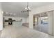 Dining area with tile floors and a view of the pool through sliding glass doors at 4087 Clock Tower Dr, Port Orange, FL 32129