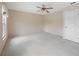 Spacious bedroom with neutral carpet, ceiling fan, and one window at 483 Green Spring Cir, Winter Springs, FL 32708