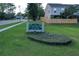 Community entrance sign surrounded by grass and landscaping at 483 Green Spring Cir, Winter Springs, FL 32708