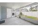 A view of the covered patio with concrete flooring looking out to the fenced backyard at 483 Green Spring Cir, Winter Springs, FL 32708