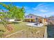 Expansive backyard with lush greenery, a patio, and a charming atmosphere at 5108 Avignon Ct, Orlando, FL 32839