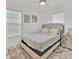 Cozy bedroom with plush bedding, ample natural light, and stylish bedside decor at 5108 Avignon Ct, Orlando, FL 32839