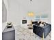 Bright living room featuring a fireplace, modern decor, and views of the backyard at 5108 Avignon Ct, Orlando, FL 32839