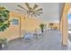 Spacious covered patio with ample seating and a view of the backyard at 5108 Avignon Ct, Orlando, FL 32839