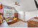 bedroom with boat-shaped bed, storage, and a window view at 5150 Banana Point Dr, Okahumpka, FL 34762