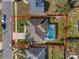 Aerial view of property and surrounding neighborhood with pool and yard at 5173 Clarion Oaks Dr, Orlando, FL 32808