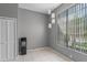 Neutral room with tile flooring, white closet doors, and natural light from window at 5173 Clarion Oaks Dr, Orlando, FL 32808