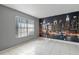 Room featuring tile flooring, cityscape wall art, and natural light from the window at 5173 Clarion Oaks Dr, Orlando, FL 32808