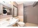 Powder room featuring an ornate framed mirror and a pedestal sink at 5214 E Kaley St, Orlando, FL 32812