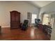 Bedroom featuring a large desk, wood flooring and a chair at 5337 Watervista Dr, Orlando, FL 32821