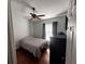 Bedroom featuring a ceiling fan, window with blinds and a dresser at 5337 Watervista Dr, Orlando, FL 32821