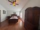 Spacious main bedroom featuring a large bed and wood flooring at 5337 Watervista Dr, Orlando, FL 32821