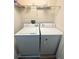 Laundry room with appliances and shelving at 6292 Twain Street # 108, Orlando, FL 32835