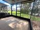 A screened porch with a view of the backyard at 6292 Twain Street # 108, Orlando, FL 32835