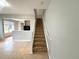 Carpeted staircase leading to the second floor of the townhome at 6292 Twain Street # 108, Orlando, FL 32835