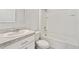 Bright bathroom with vanity sink and shower-tub combination at 6745 Huntleigh Hammock Rd, Harmony, FL 34773