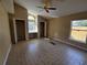 Bright main bedroom featuring vaulted ceiling, windows, and large closets at 6856 Ebans Bnd, Orlando, FL 32807