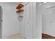 Hallway features shelves and closets that provide extra storage space at 705 Northlake Dr # 705, Sanford, FL 32773