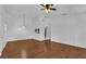 Open living area with light-colored walls and wood flooring at 705 Northlake Dr # 705, Sanford, FL 32773