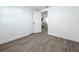 Bright bedroom with light wood-look floors and a closet for ample storage space at 850 Rosalia Dr, Sanford, FL 32771