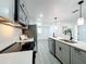 Modern kitchen featuring stainless steel appliances, white countertops, and gray cabinetry at 850 Rosalia Dr, Sanford, FL 32771