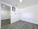 Neutral-colored laundry room with a tankless water heater and vinyl floors at 850 Rosalia Dr, Sanford, FL 32771