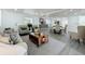 Open-concept living area flowing into the dining room and kitchen with modern finishes at 850 Rosalia Dr, Sanford, FL 32771