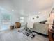 Bright main bedroom featuring recessed lighting, neutral tones, and light gray wood-look floors at 850 Rosalia Dr, Sanford, FL 32771