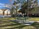 Community picnic area providing green space, seating, and tranquil setting for outdoor enjoyment at 13028 Plantation Park Cir # 1218, Orlando, FL 32821