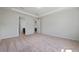 Cozy bedroom featuring neutral carpet, and an open doorway for versatile use of space at 13270 Panama Beach Ct, Orlando, FL 32827