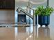 Close-up of a kitchen sink area featuring a modern faucet, countertop, and stainless steel refrigerator at 13270 Panama Beach Ct, Orlando, FL 32827