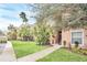 Well-manicured grounds enhance this beautiful building's exterior at 13500 Turtle Marsh Loop # 839, Orlando, FL 32837