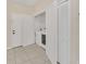 Clean, bright laundry room with washer, dryer and multiple storage options at 13500 Turtle Marsh Loop # 839, Orlando, FL 32837